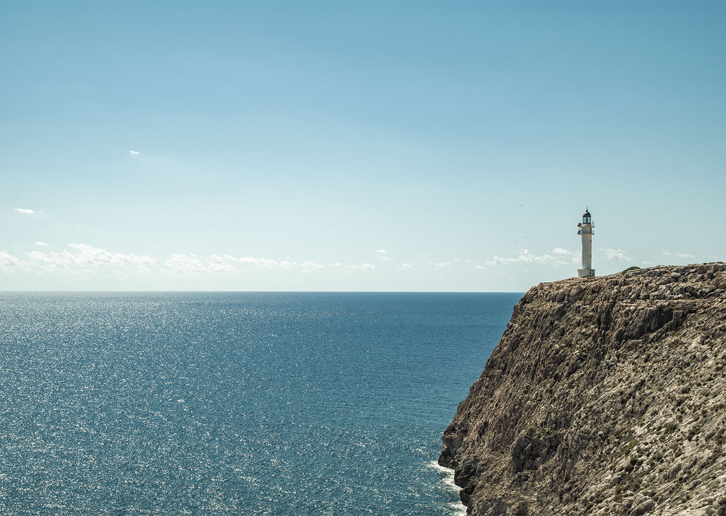 Cliff and lighthouse Far del Cap de Barbaria, Formentera, Spain, (Nos Dren).