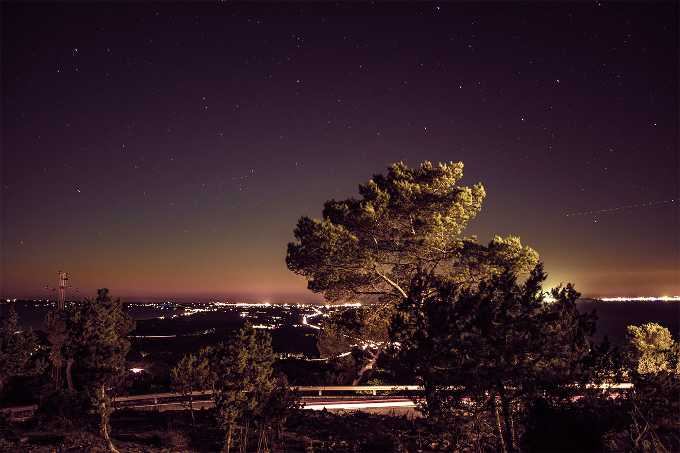 Slow speed shutter night photography with stars from Es Mirador landscape view at La Mola, Formentera, (Nos Dren).
