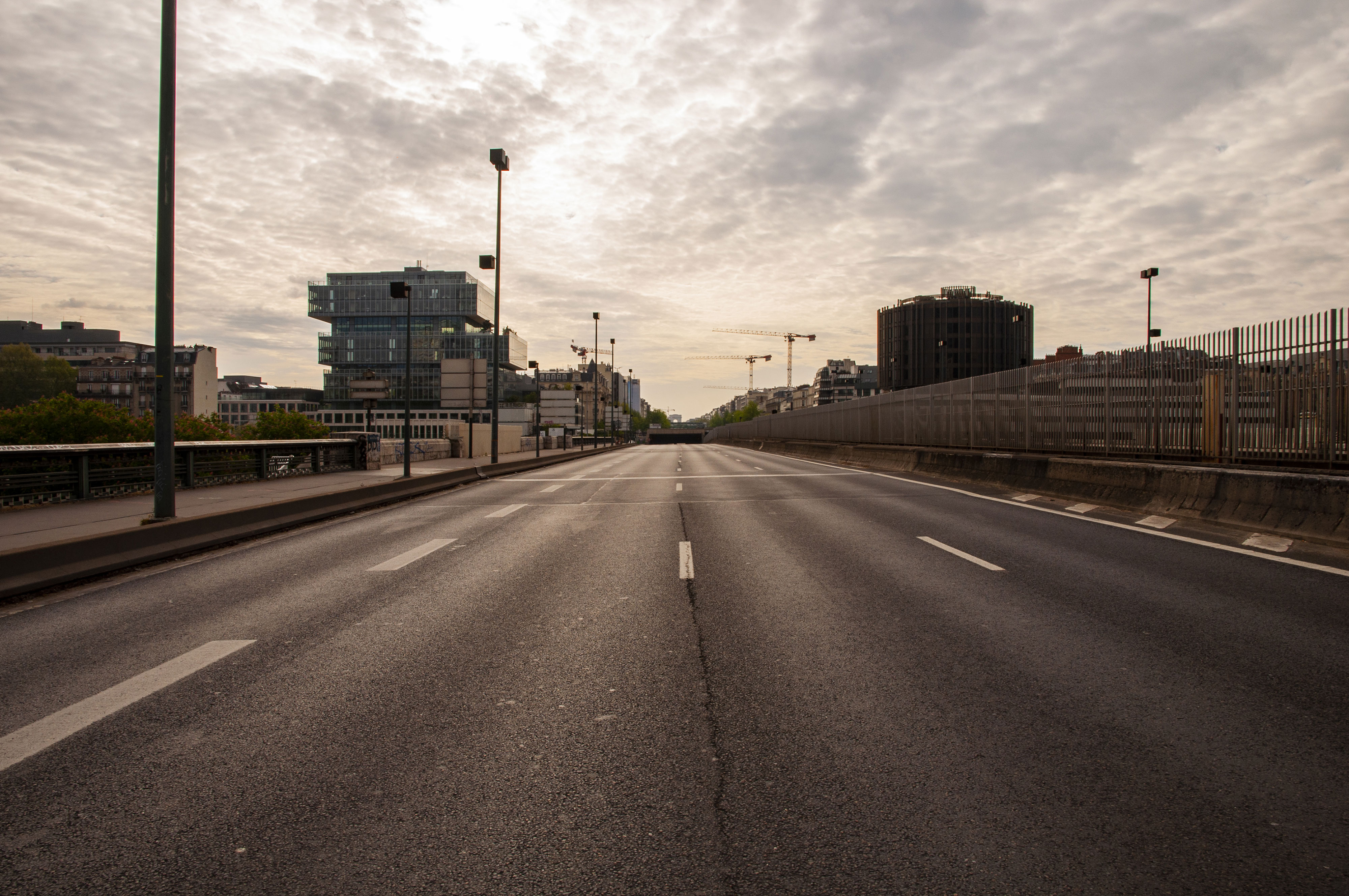 The empty road on the bridge Pont De Neuilly, between Neuilly-Sur-Seine and Paris La Défense, France. (Nos Dren)