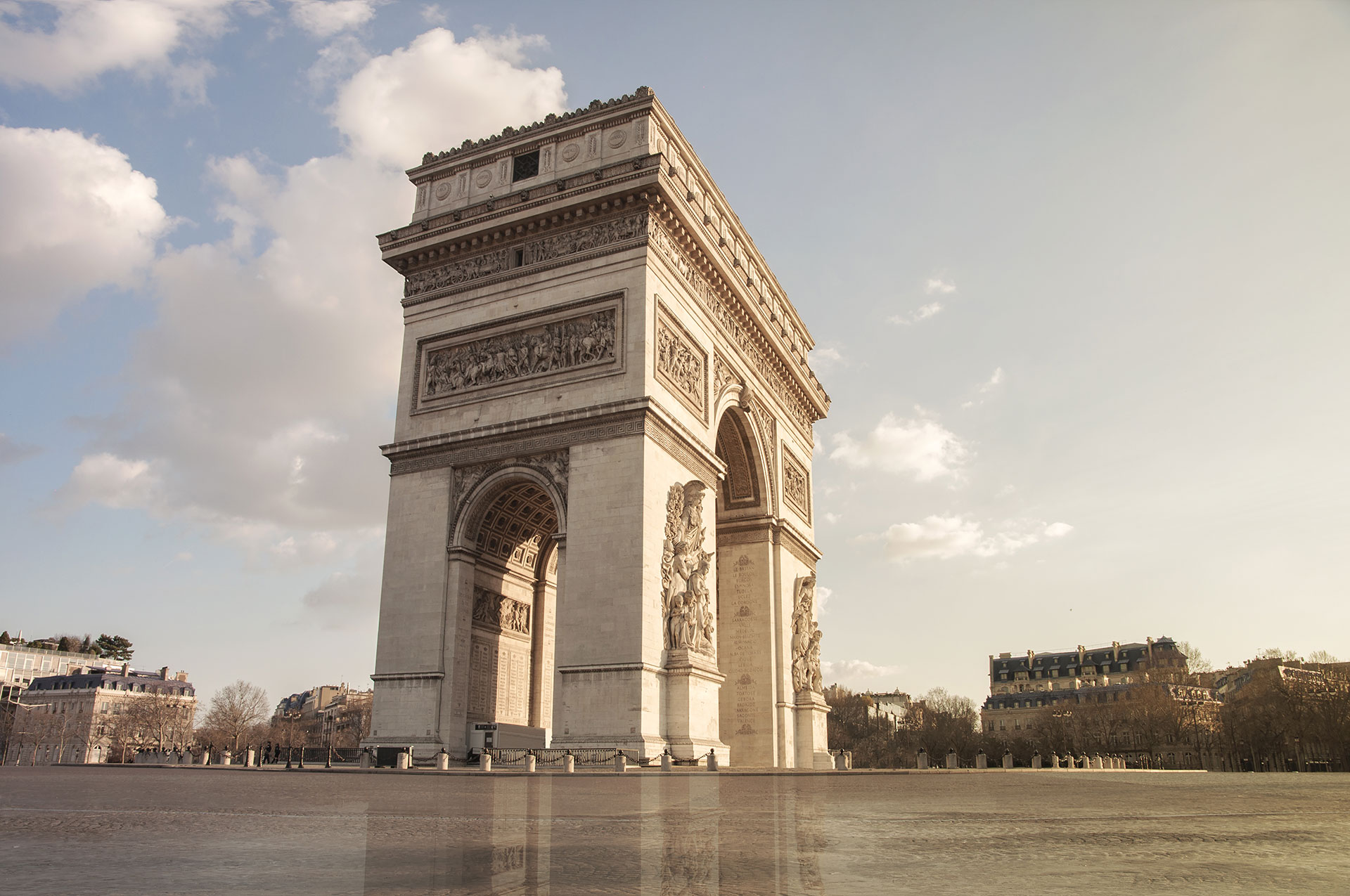 Paris Arc de Triomphe or The Triumphal Arch of Paris Charles-de-Gaulle Etoile, without anybody, no car, no pedestrian because of the quarantine due to the Coronavirus COVID-19 2020 , (Nos Dren)