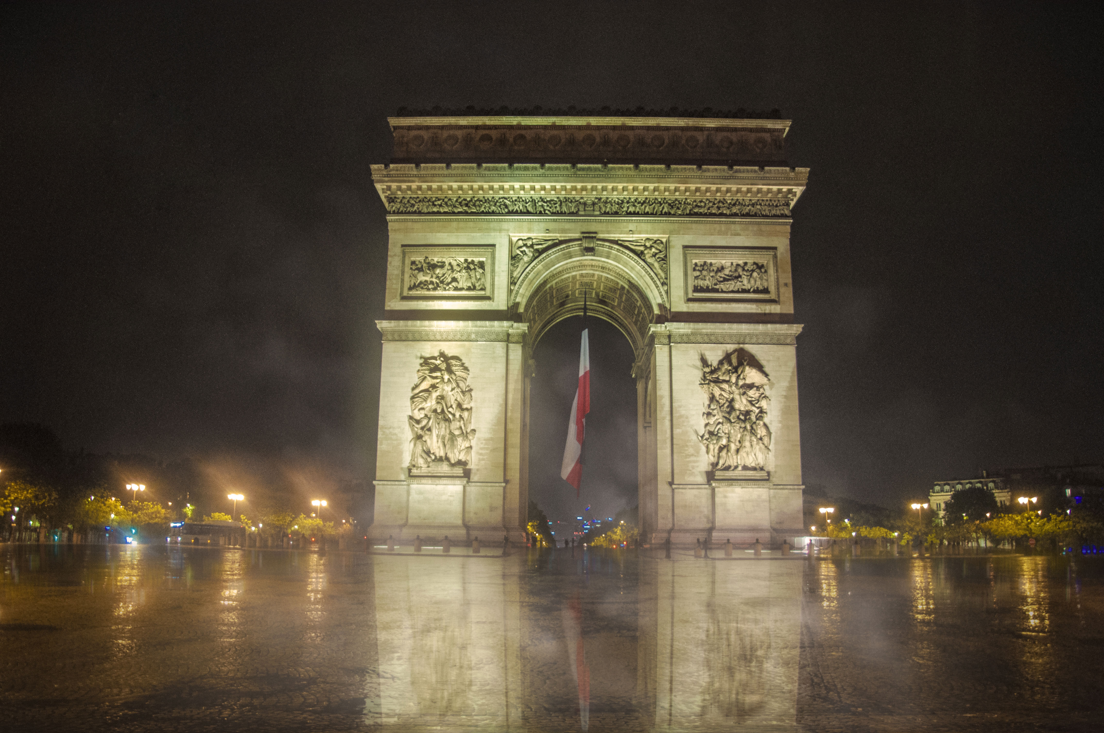 Paris Arc de Triomphe under the storm and rain during the quarantine due to the new coronavirus COVID-19 2020, (Nos Dren)