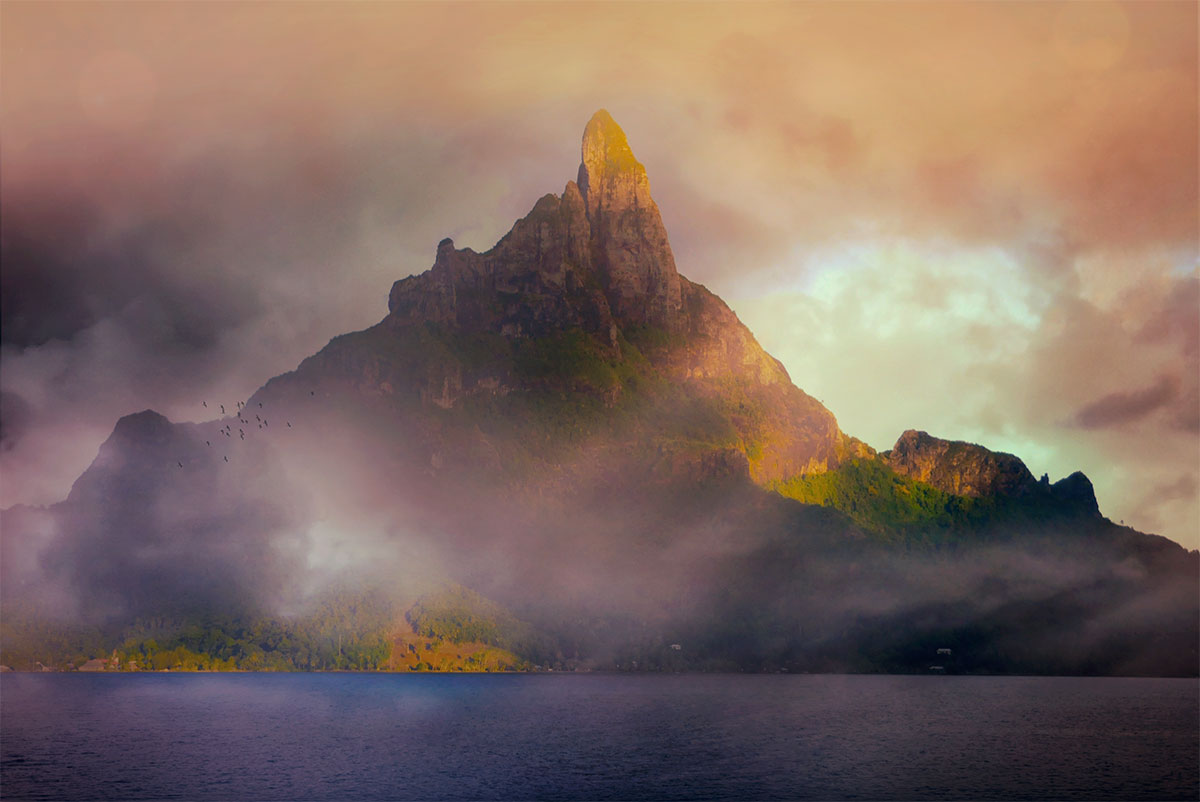French Polynesia, Bora Bora island, mount Otemanu in middle of frog by sunset, dramatic photography. (Nos Dren)