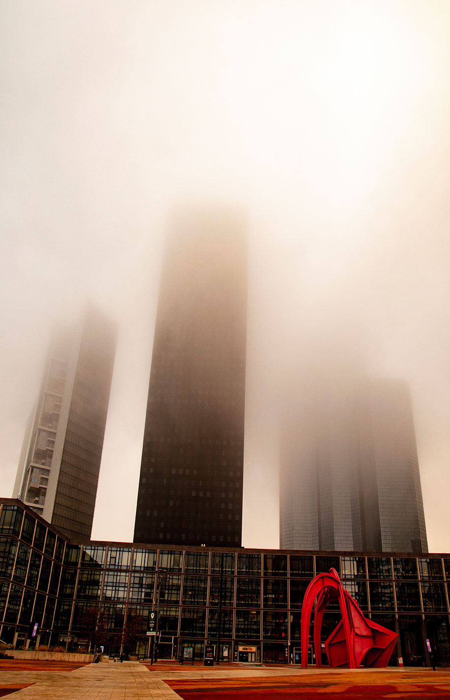 Mist and fog through the skyscrapers of Paris La Defense, France. (Nos Dren)